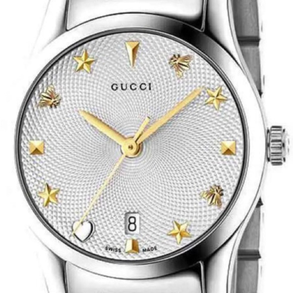 Gucci Stainless Steel Timepiece with bracelet band. Still in excellent condition